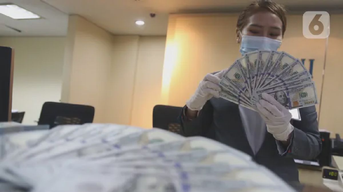 Rupiah Ditutup Melemah Tipis ke Level Rp14.640 per Dolar AS